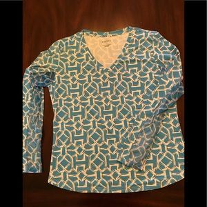 Cute golf or casual top.